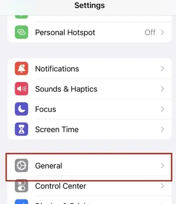 To clear the iPhone cache, first find General in your iPhone settings.